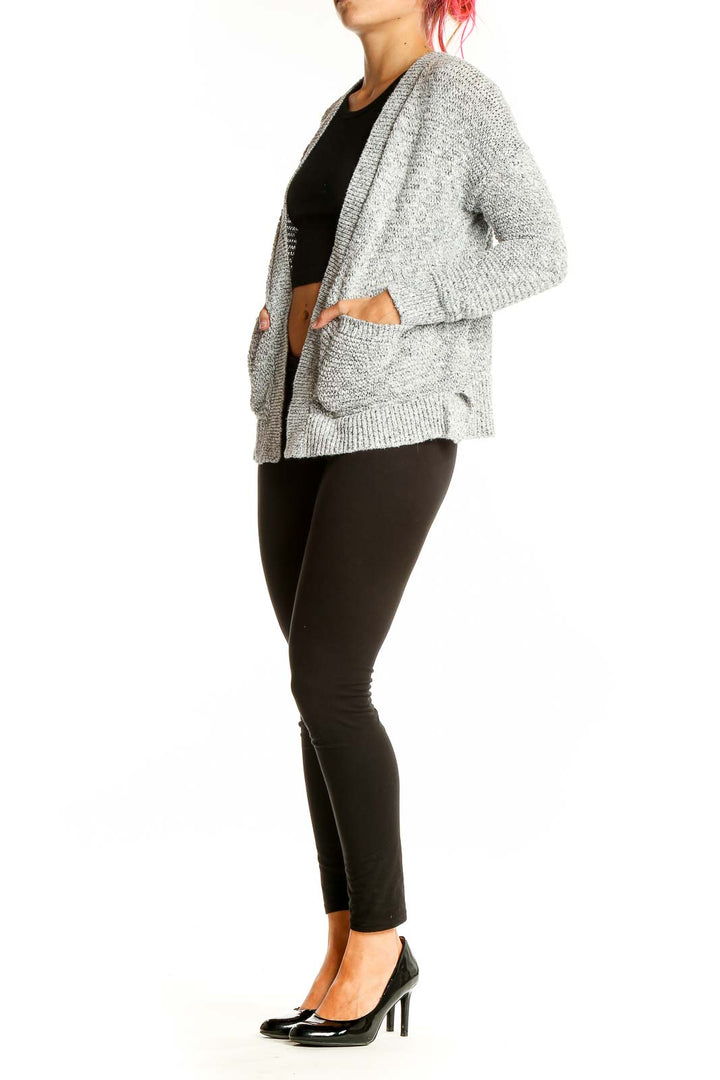 Front view of Madewell gray open-front cardigan with shawl collar