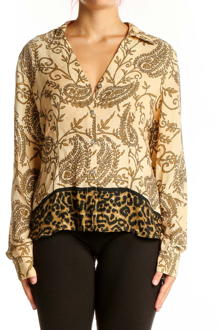 Front view of Victoria SOIE beige silk blouse with paisley print and leopard trim