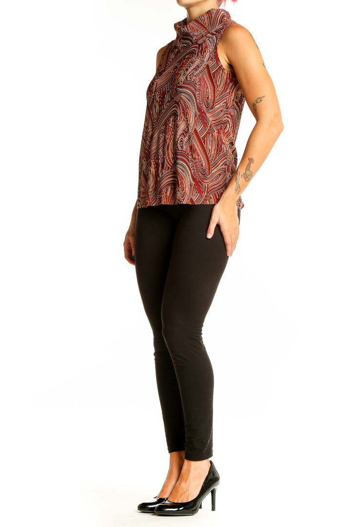 Front view of Giorgio Fiorlini red swirl pattern sleeveless turtleneck top