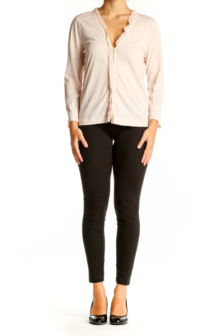 Front view of J.Crew blush pink cotton knit cardigan with frayed edges