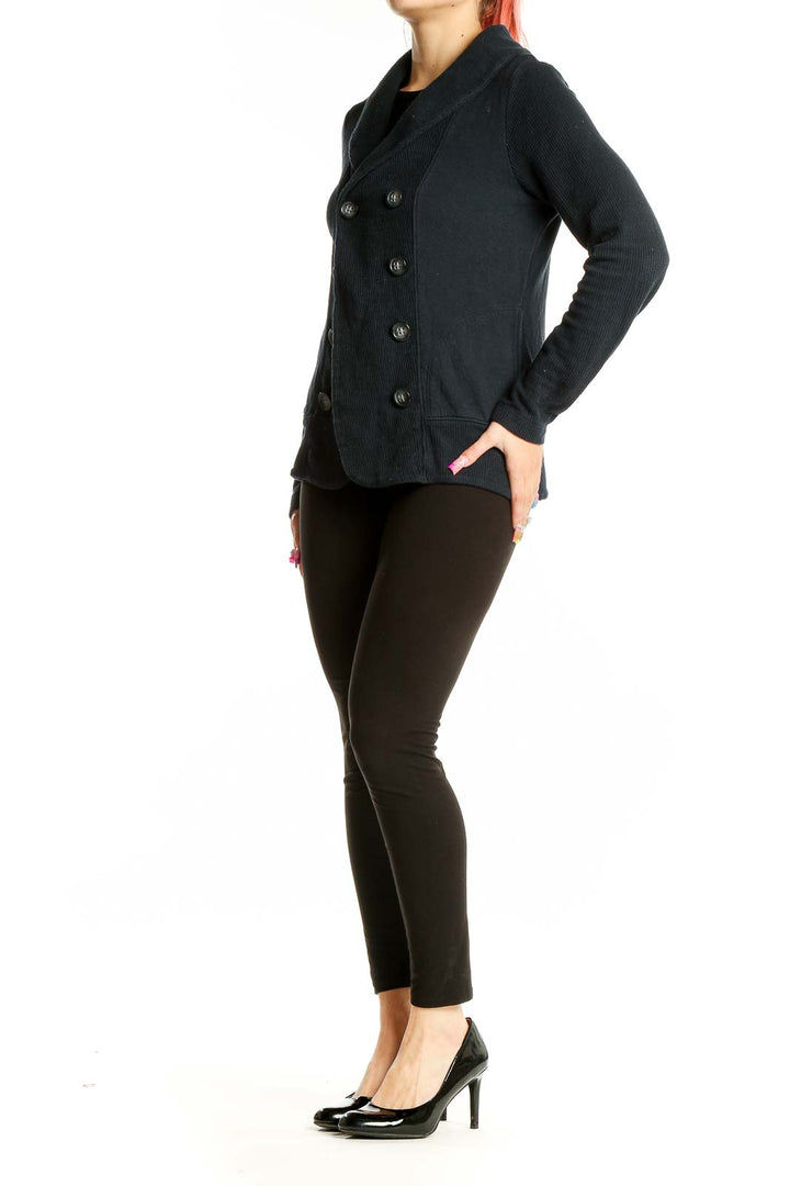 Front view of Rock Steady black double-breasted knit cardigan with shawl collar