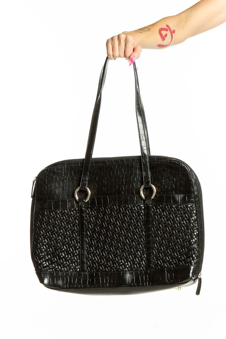 Front view of black woven leather shoulder bag by Coldwater Creek