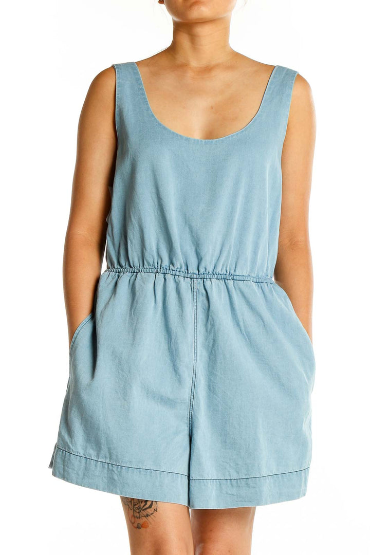 Front view of light blue cotton romper with scoop neckline