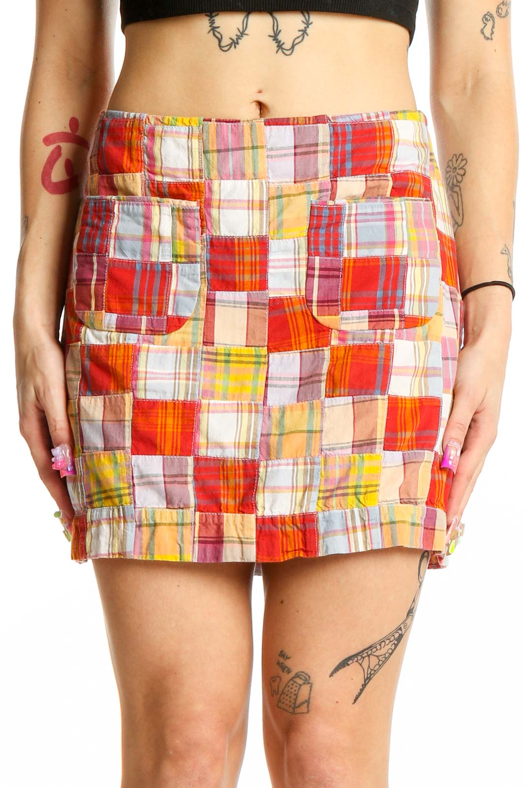 Front view of J.Crew multicolor patchwork mini skirt with front pockets