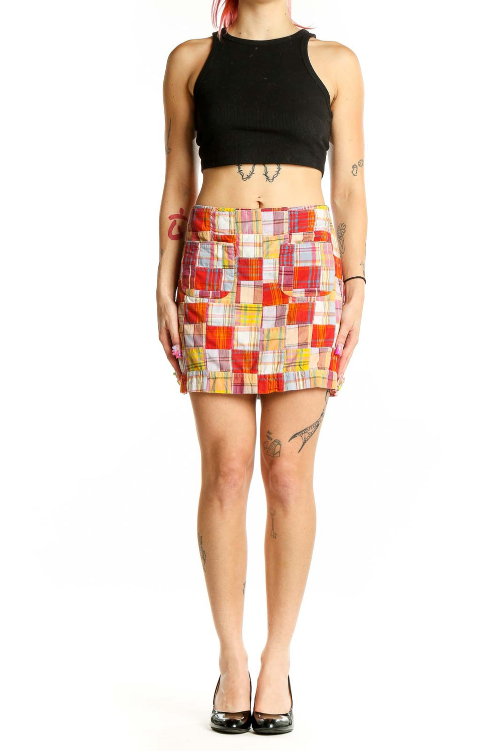 Front view of J.Crew multicolor patchwork mini skirt with front pockets