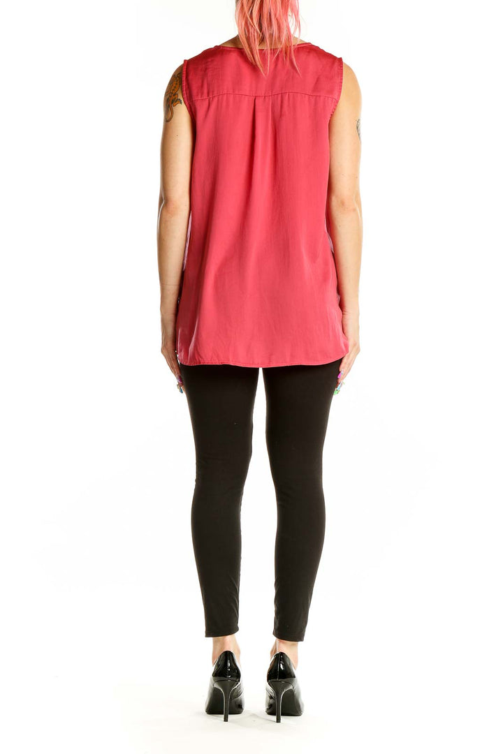 Back view of red sleeveless Cabi blouse showing relaxed fit