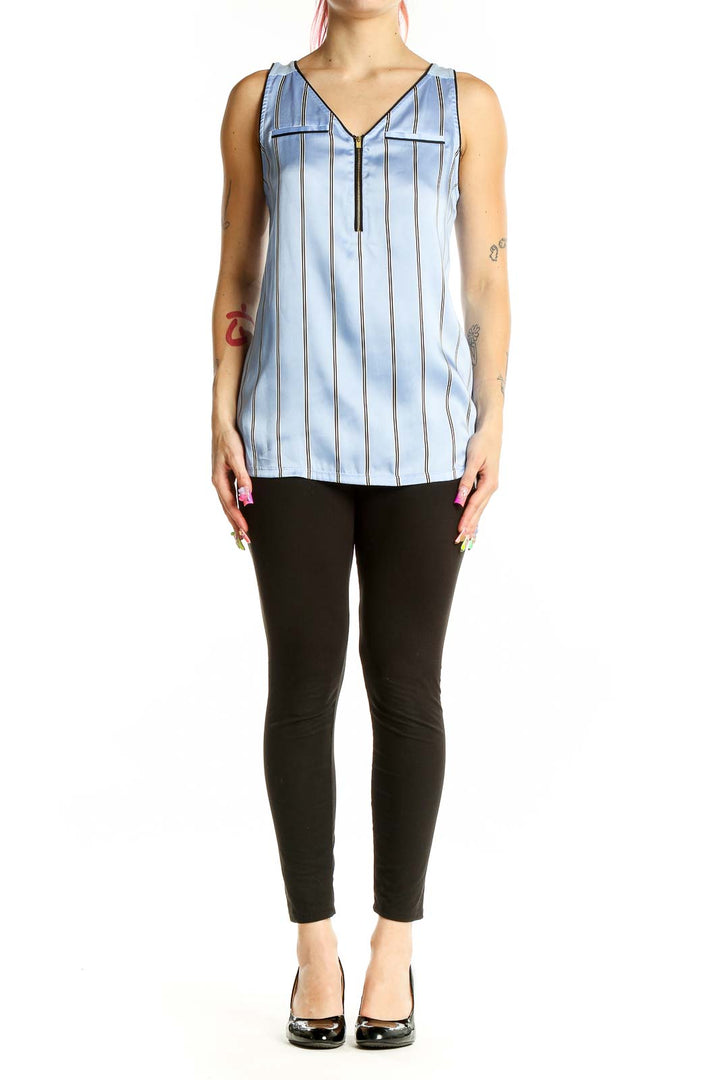 Front view of Express light blue striped sleeveless blouse with V-neck and zip closure