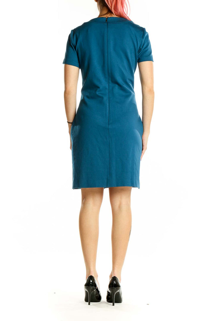 Back view of teal Trina Turk short sleeve dress