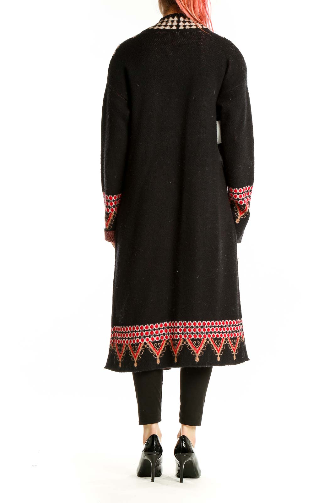 Back view of Vertigo black long cardigan showing embroidered hem detail