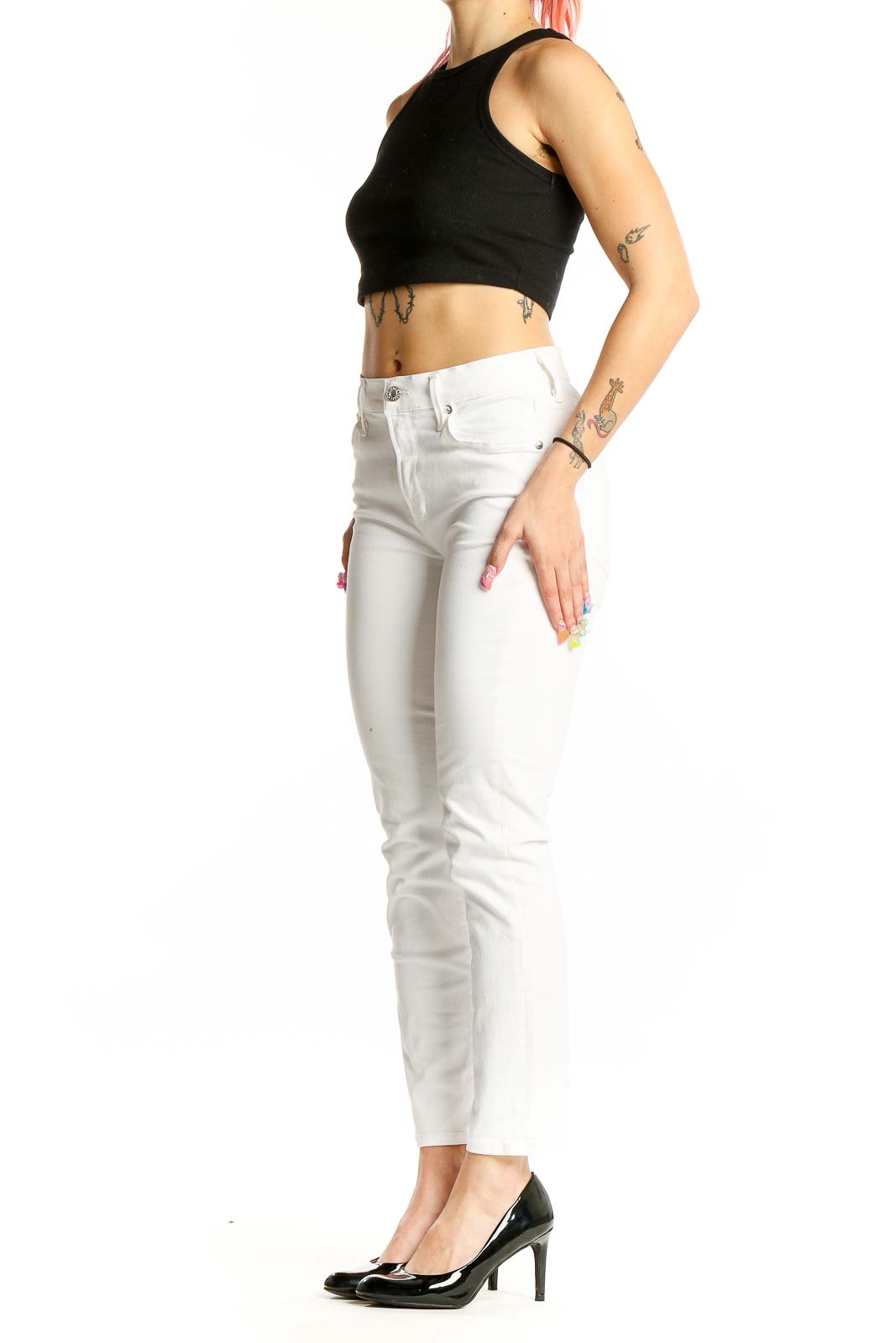 Front view of AGOLDE white slim fit jeans on model