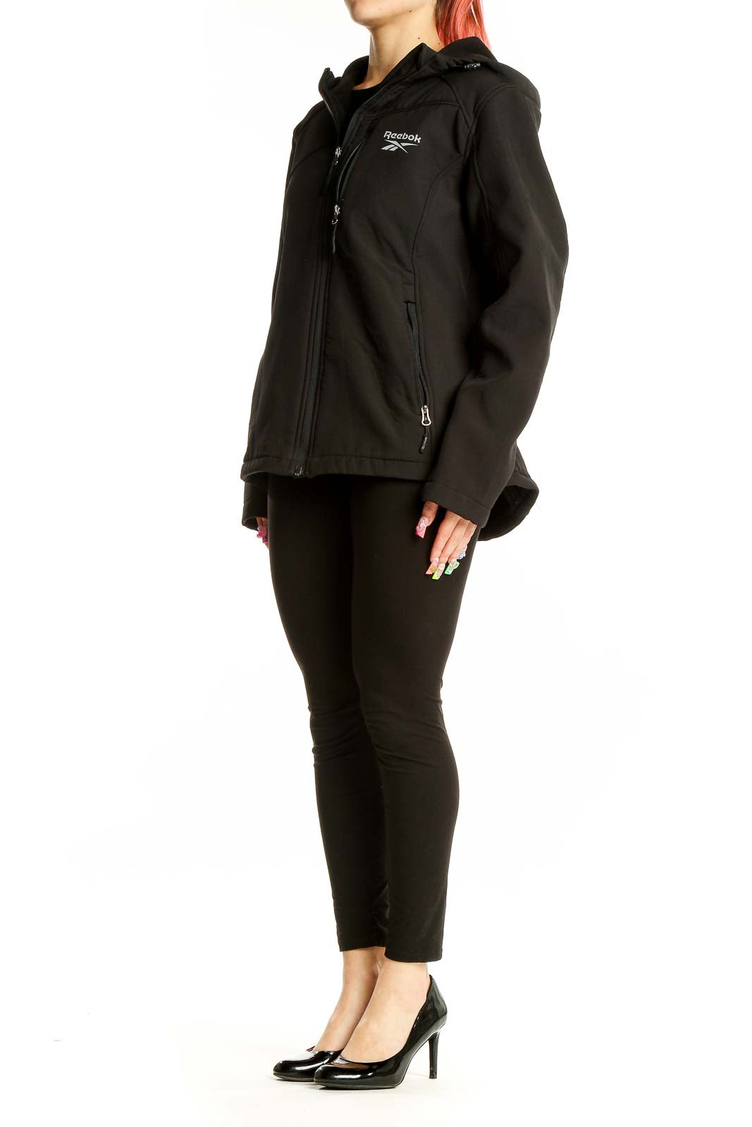 Front view of black Reebok hooded performance jacket with chest pocket