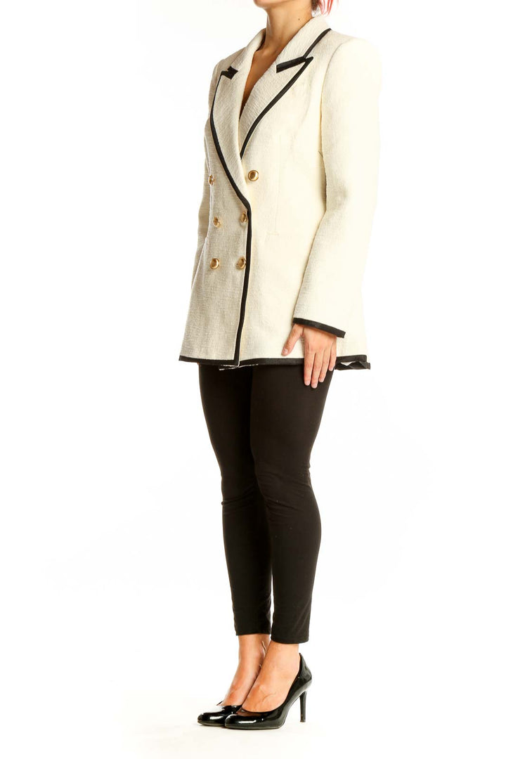 Front view of cream Express double-breasted blazer with black trim