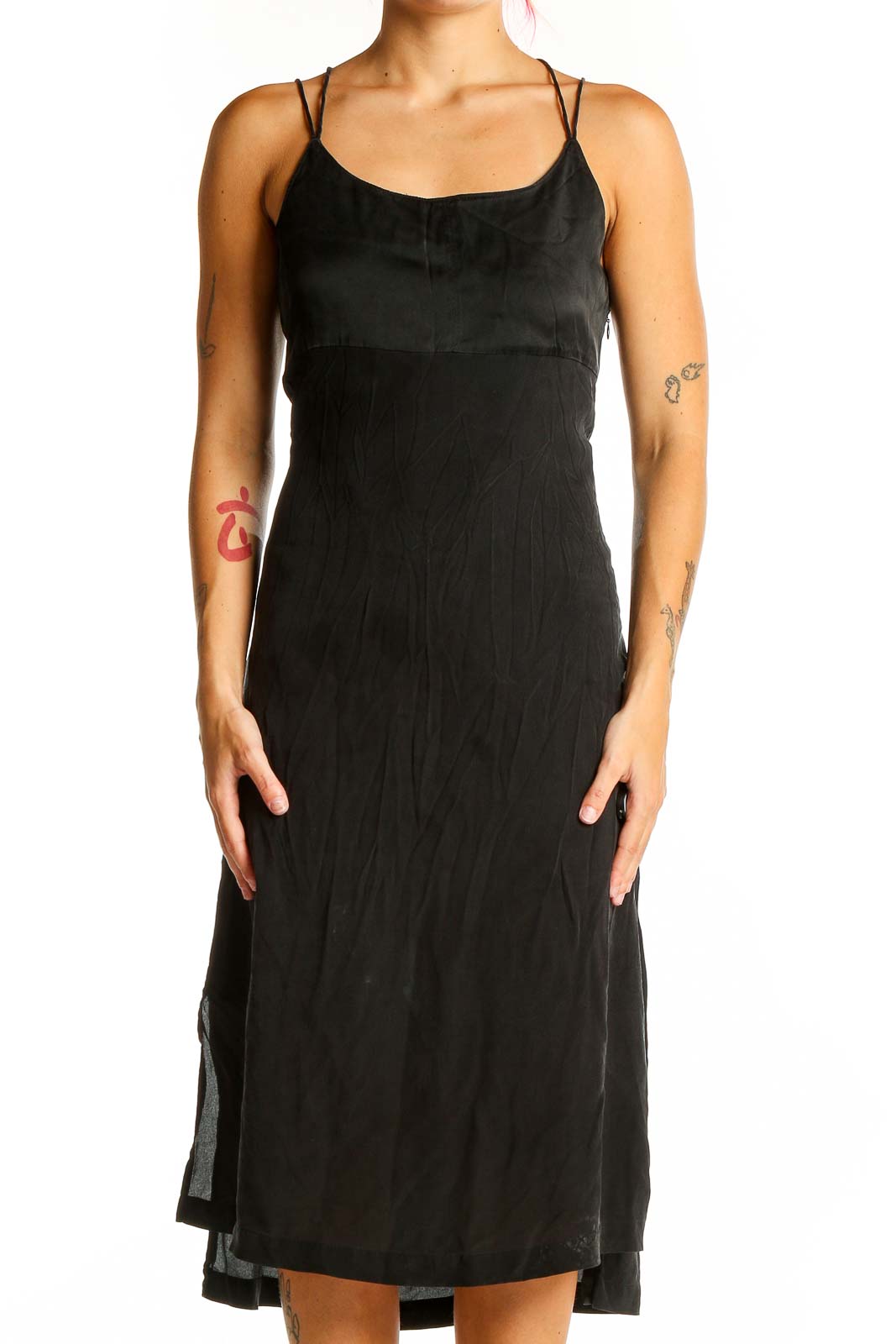 Front view of Madewell black midi slip dress with spaghetti straps