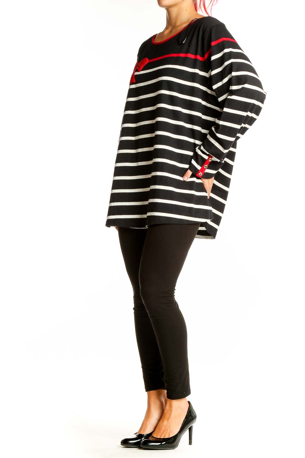 Front view of Charter Club black and white striped knit top with red bow accent