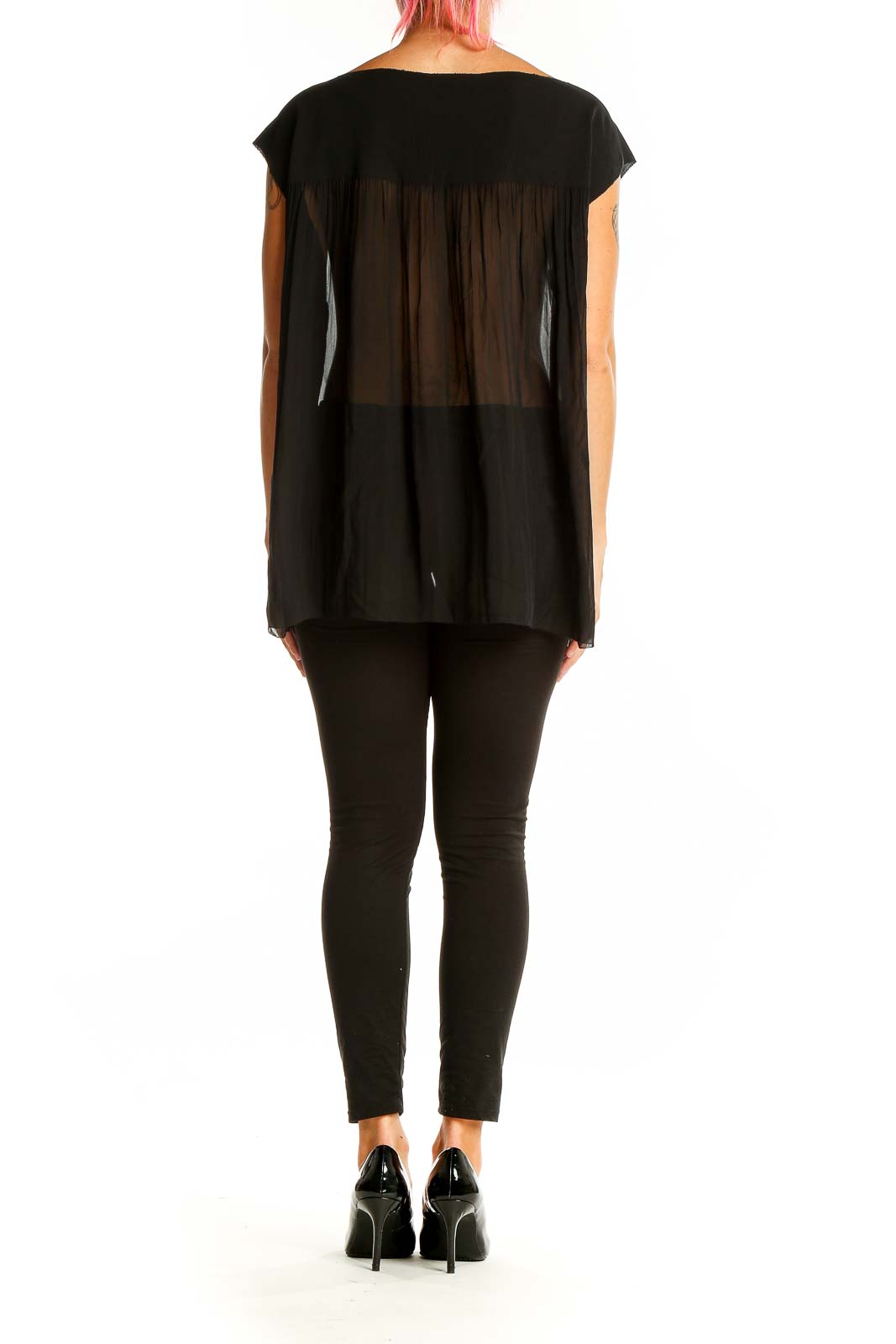 Back view of Vince black sleeveless top showing sheer design