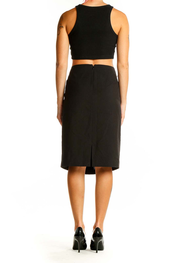 Back view of Ellen Tracy black pencil skirt showing back slit detail