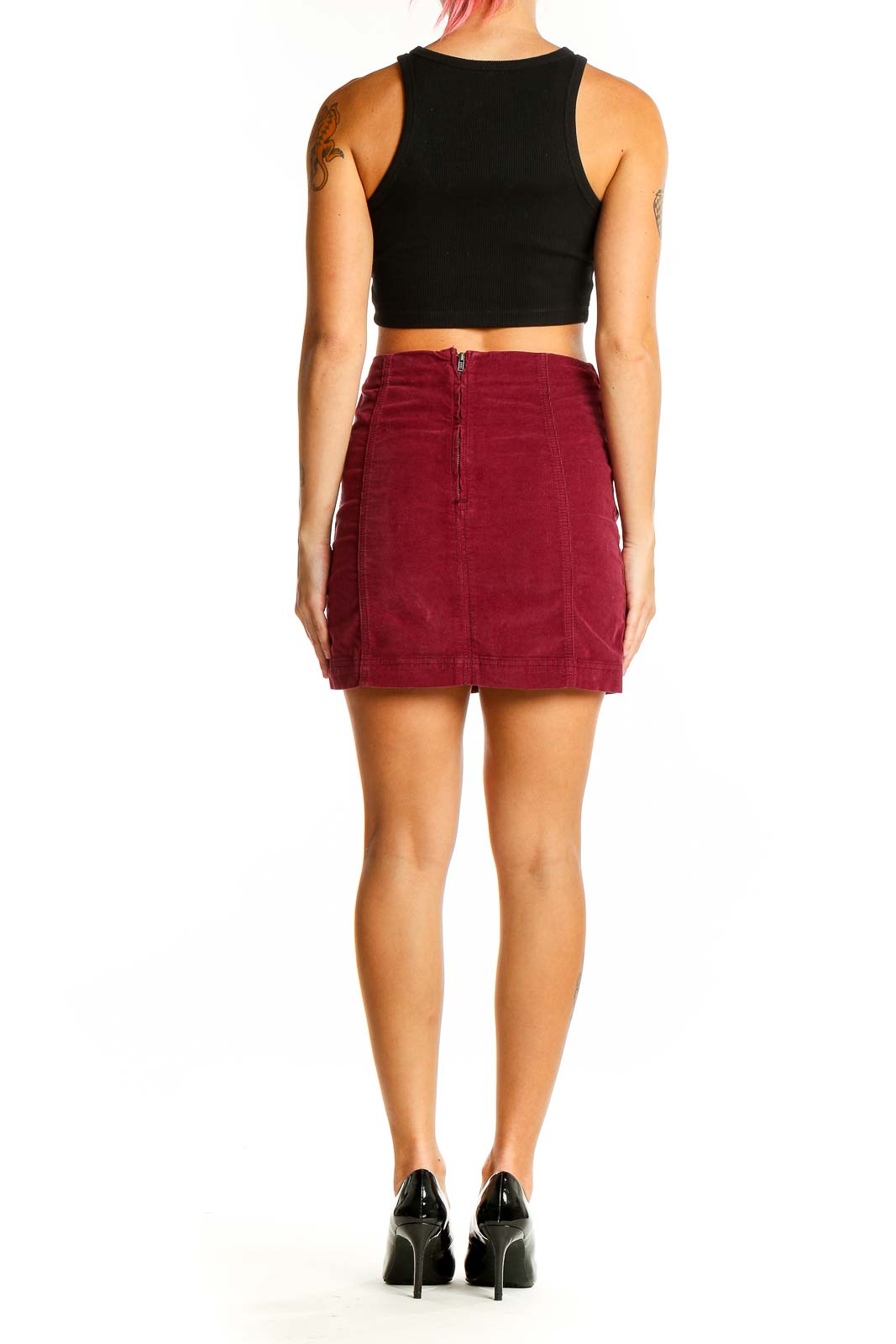 Back view of burgundy corduroy mini skirt with center zipper