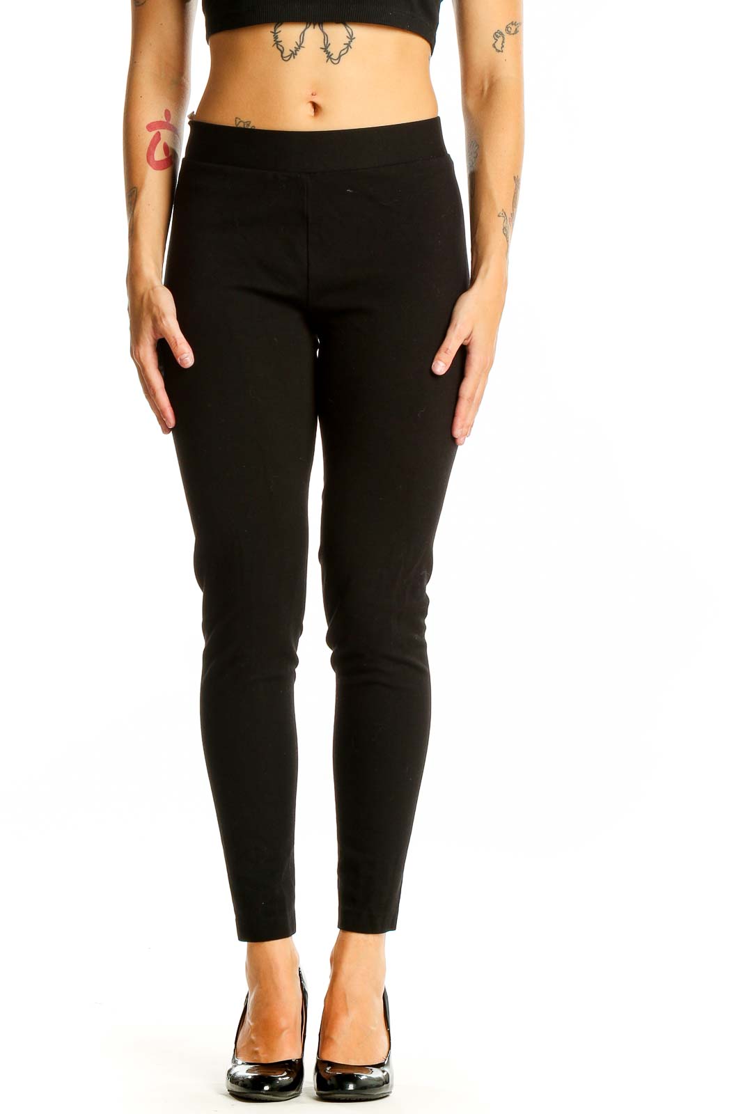 Front view of Vince Camuto black slim fit ankle-length pants