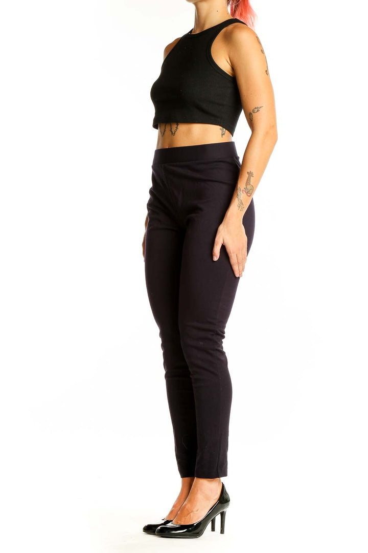 Front view of Vince Camuto black slim fit ankle-length pants