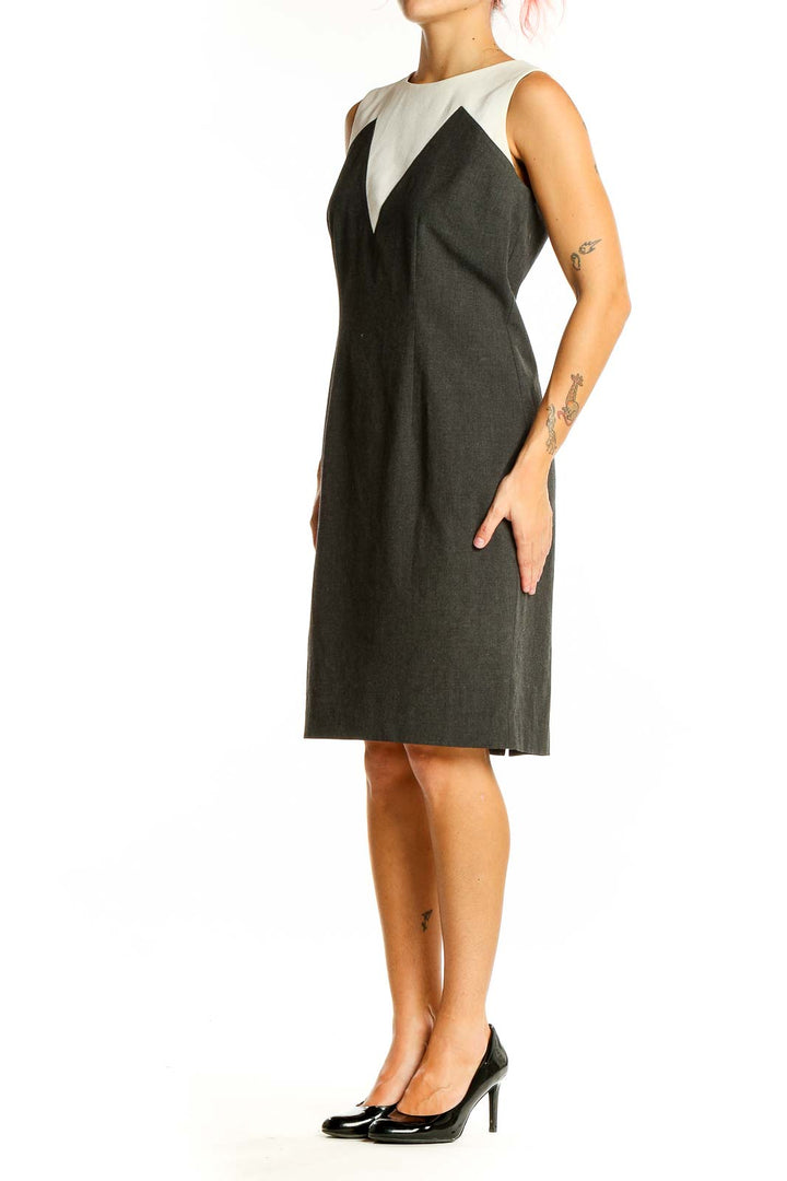 Front view of Ann Taylor charcoal sheath dress with white colorblock neckline