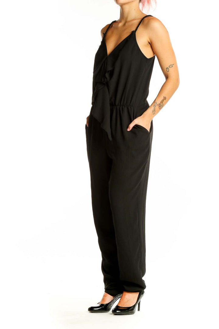 Front view of RACHEL Rachel Roy black ruffled V-neck jumpsuit