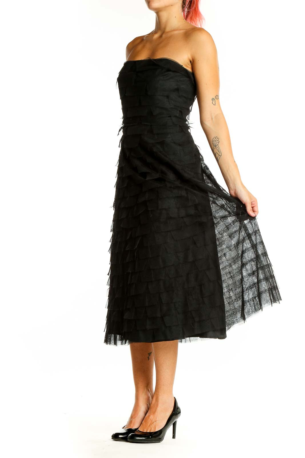 Front view of black strapless BCBG MaxAzria midi dress with tiered tulle skirt