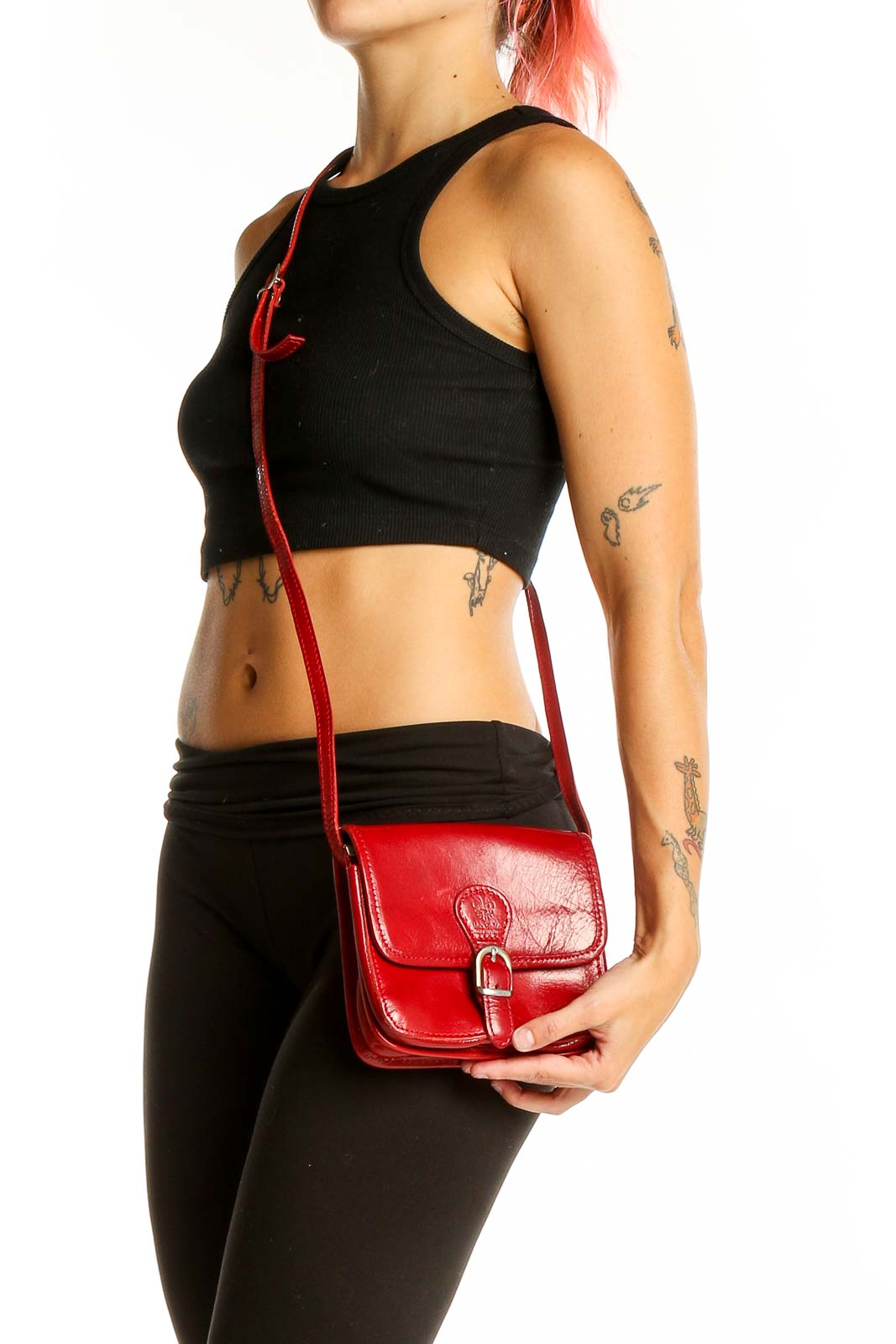 Front view of red leather Vera Pelle crossbody bag with buckle closure