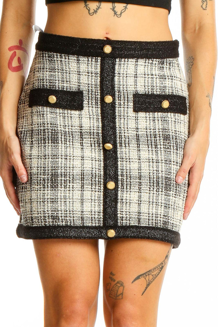 Front view of Saylor Black and White Plaid Mini Skirt with gold buttons