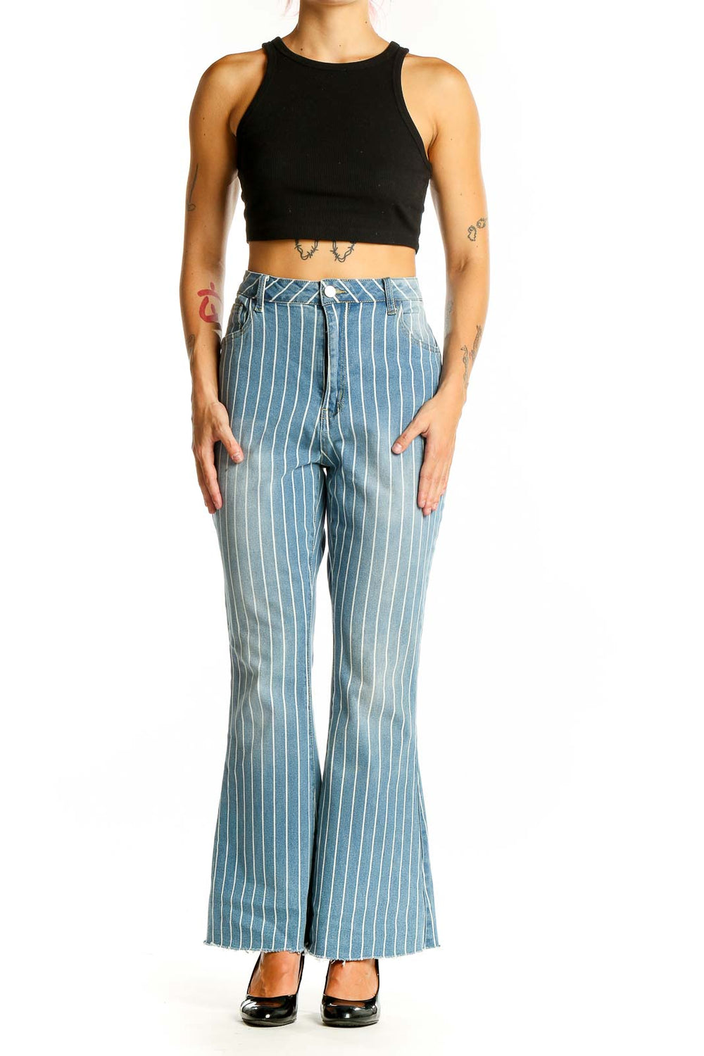 Front view of SilkRoll light blue striped flare jeans on model