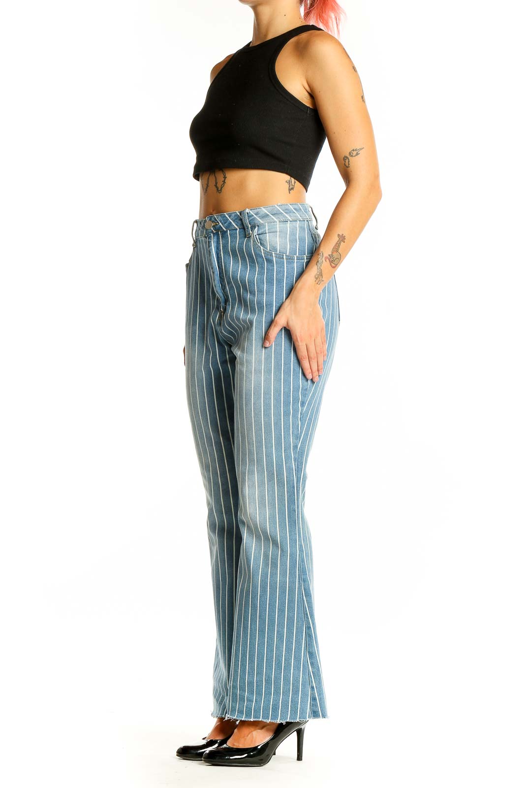 Front view of SilkRoll light blue striped flare jeans on model