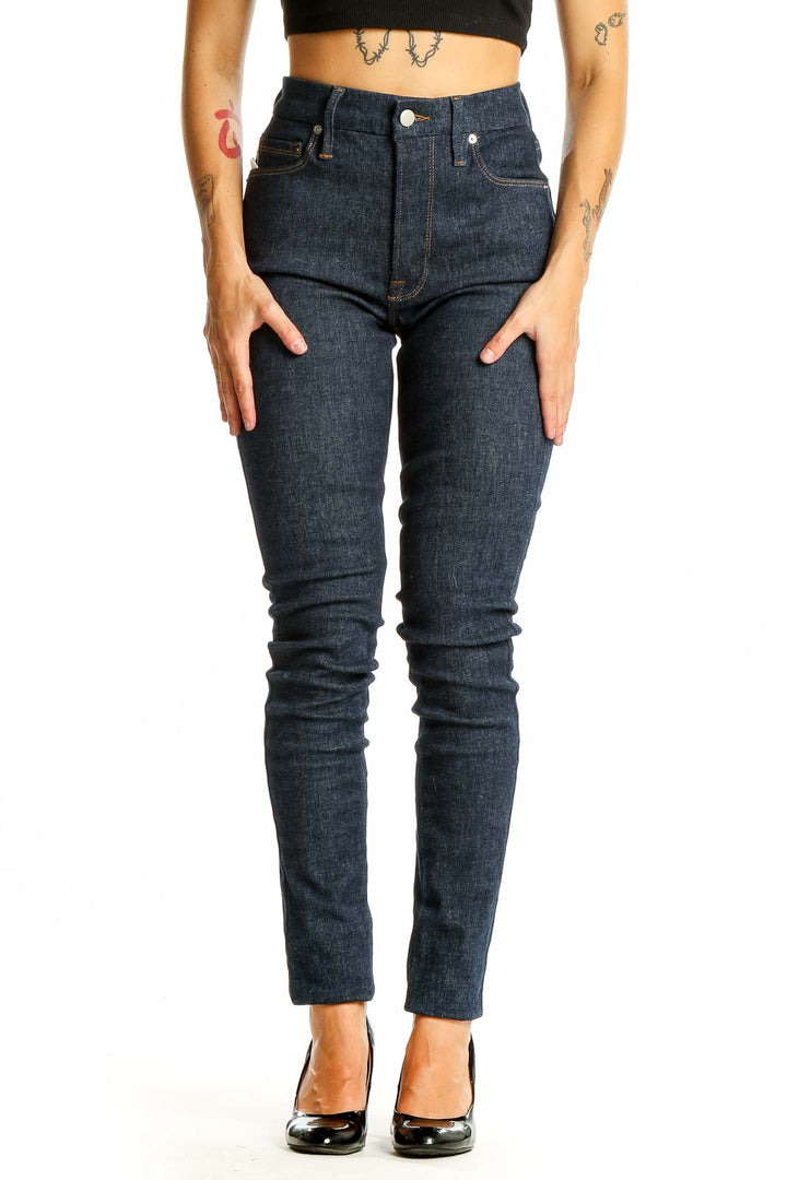 Front view of Good American dark blue high-waisted skinny jeans