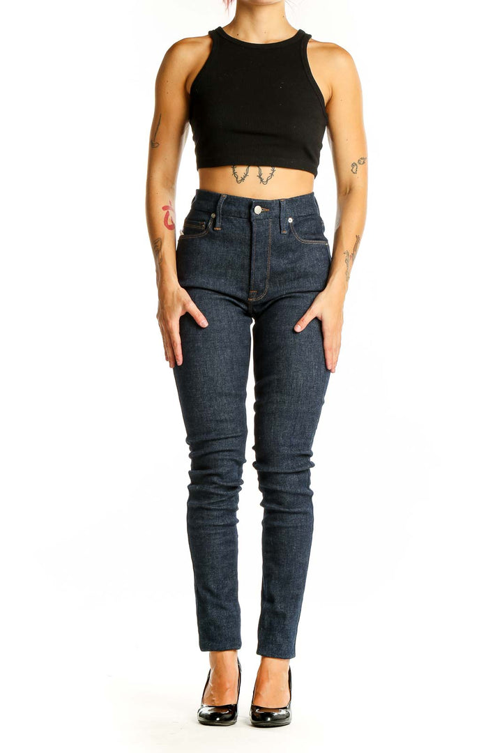 Front view of Good American dark blue high-waisted skinny jeans