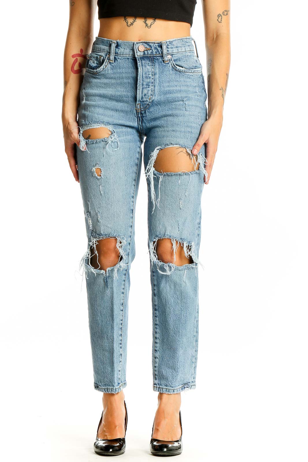 Front view of BDG light blue distressed high-waisted jeans with knee rips