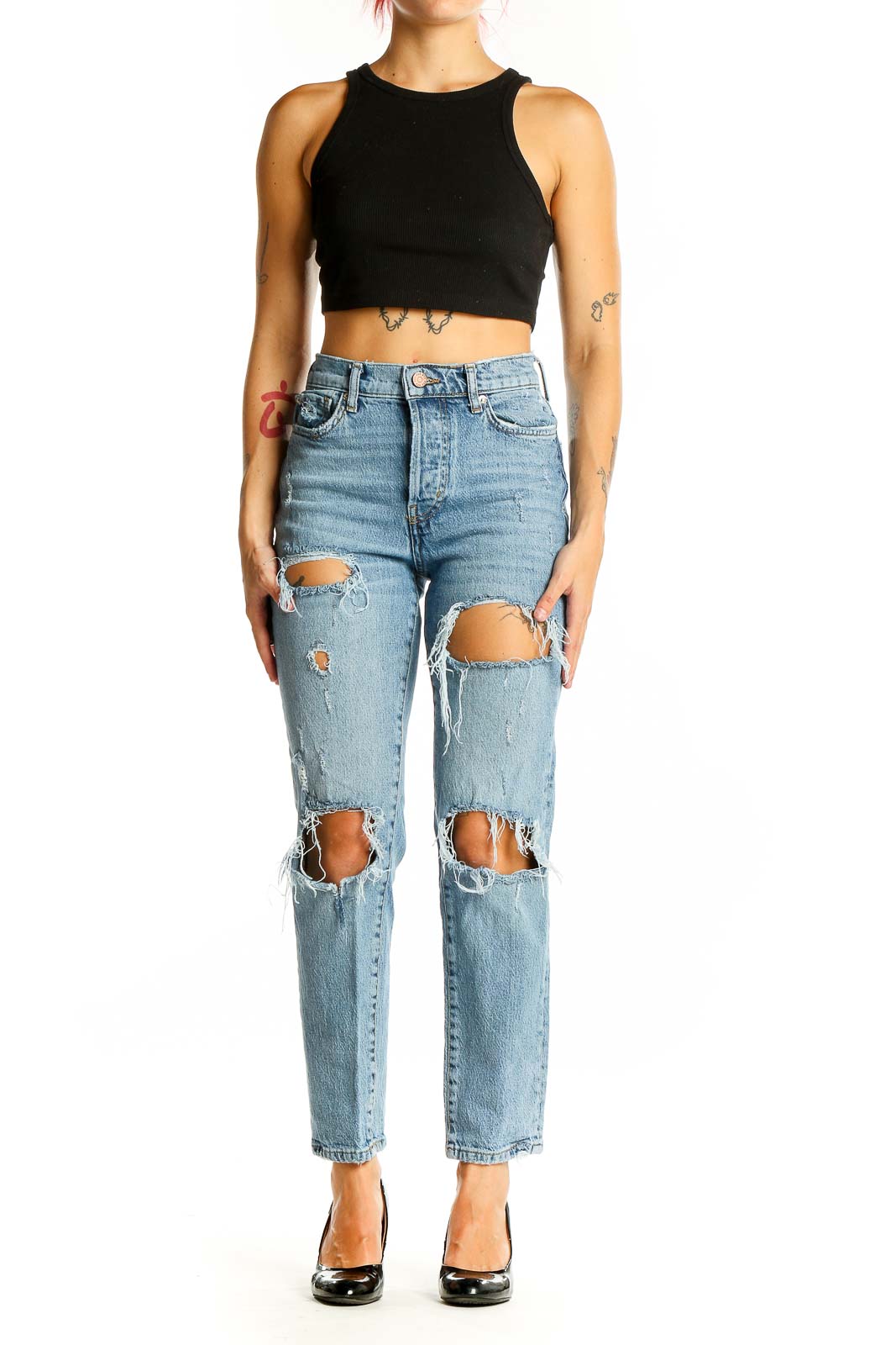 Front view of BDG light blue distressed high-waisted jeans with knee rips