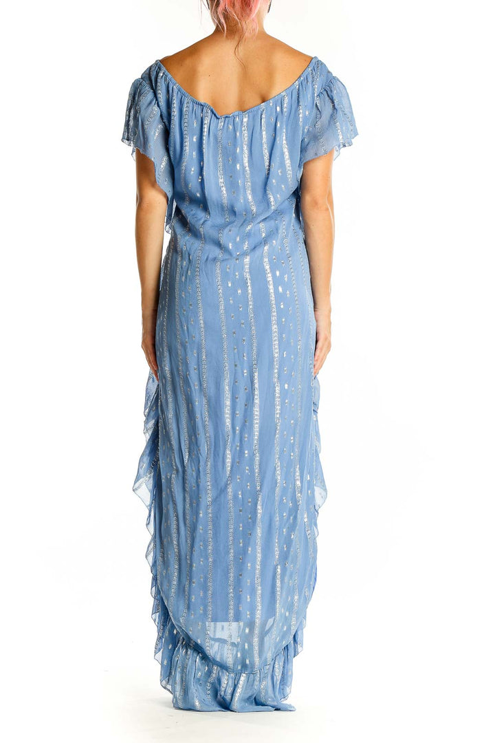 Back view of Saylor blue metallic ruffled maxi dress showing cascading side ruffles