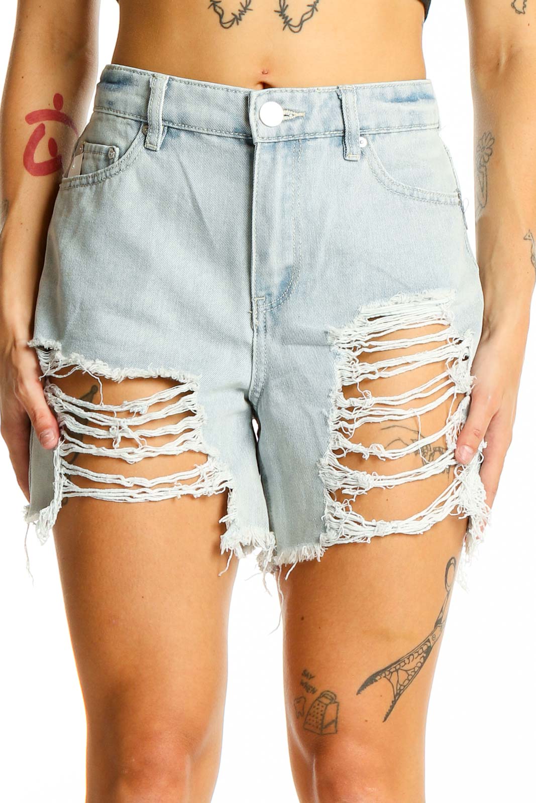 Front view of Indigo Rein light blue distressed denim shorts