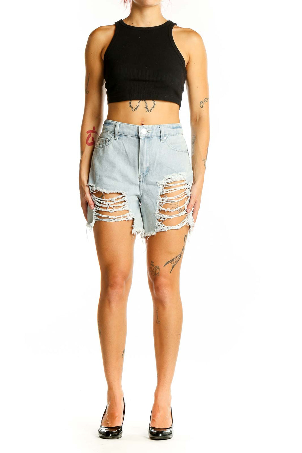 Front view of Indigo Rein light blue distressed denim shorts