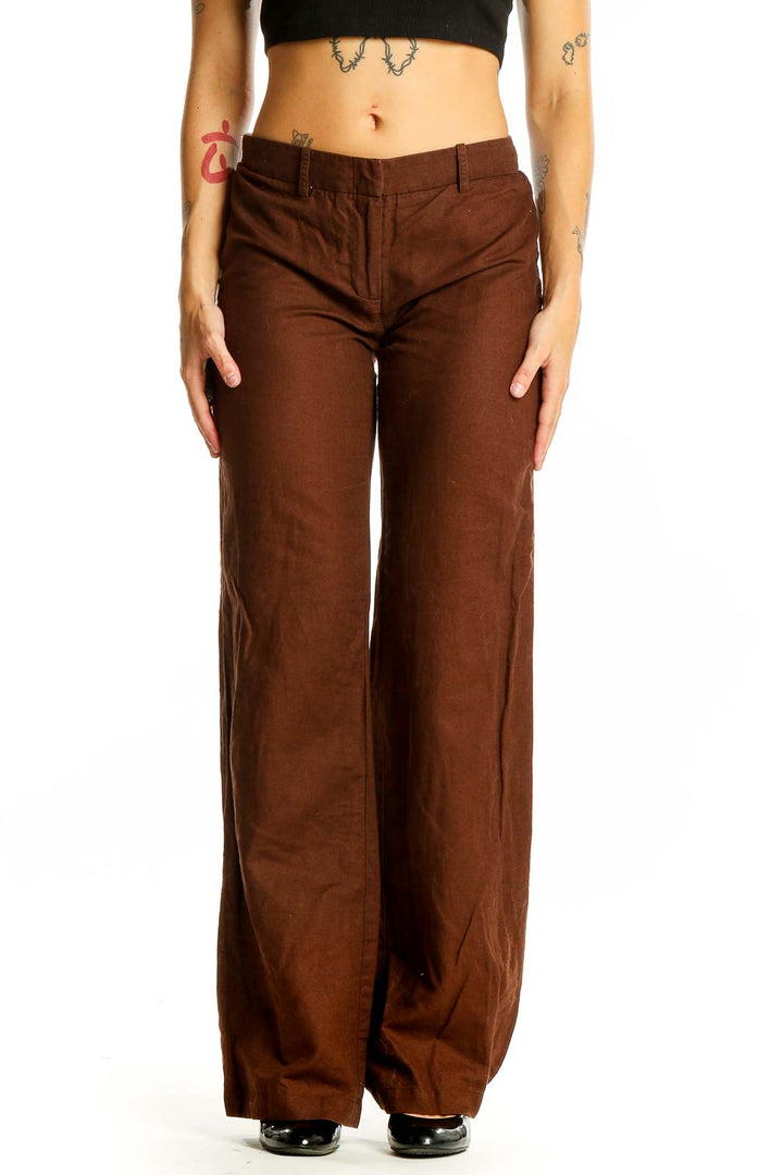 Front view of BCBG MaxAzria brown wide-leg trousers on model