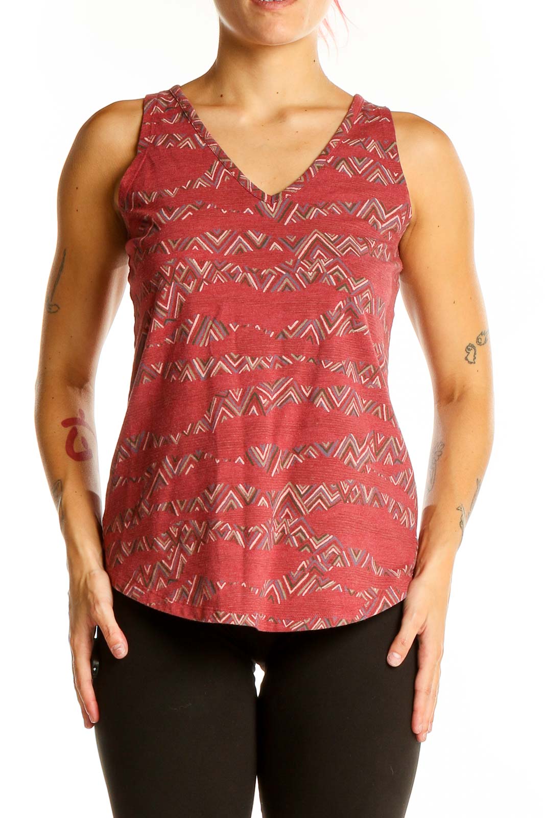 Front view of Sherpa Adventure Gear red geometric print V-neck tank top