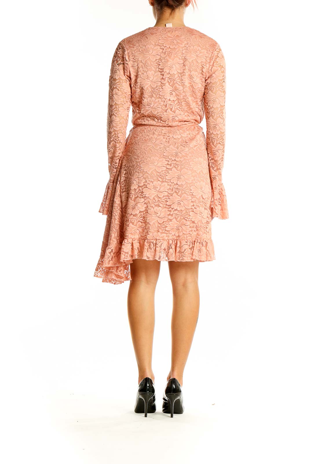 Back view of peach lace wrap dress showing full length and bell sleeves