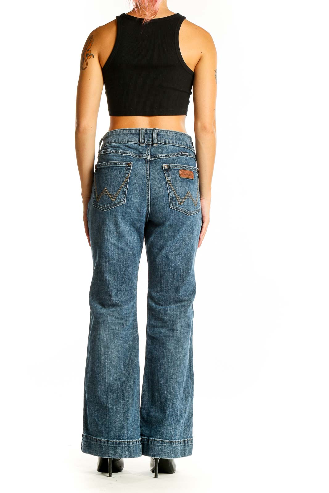 Back view of Wrangler blue wide-leg jeans showing signature pocket design