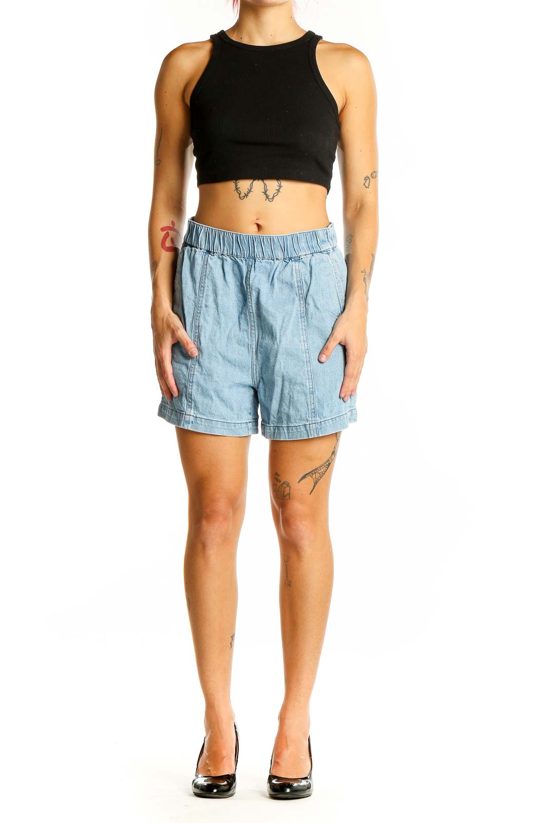 Front view of Madewell light blue denim shorts with elastic waistband