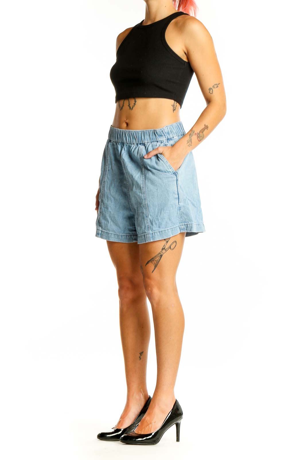 Front view of Madewell light blue denim shorts with elastic waistband