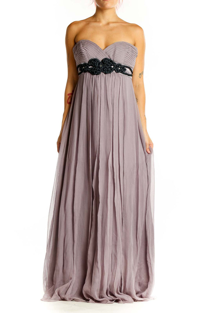 Front view of lavender strapless BCBG MaxAzria gown with black beaded waistline