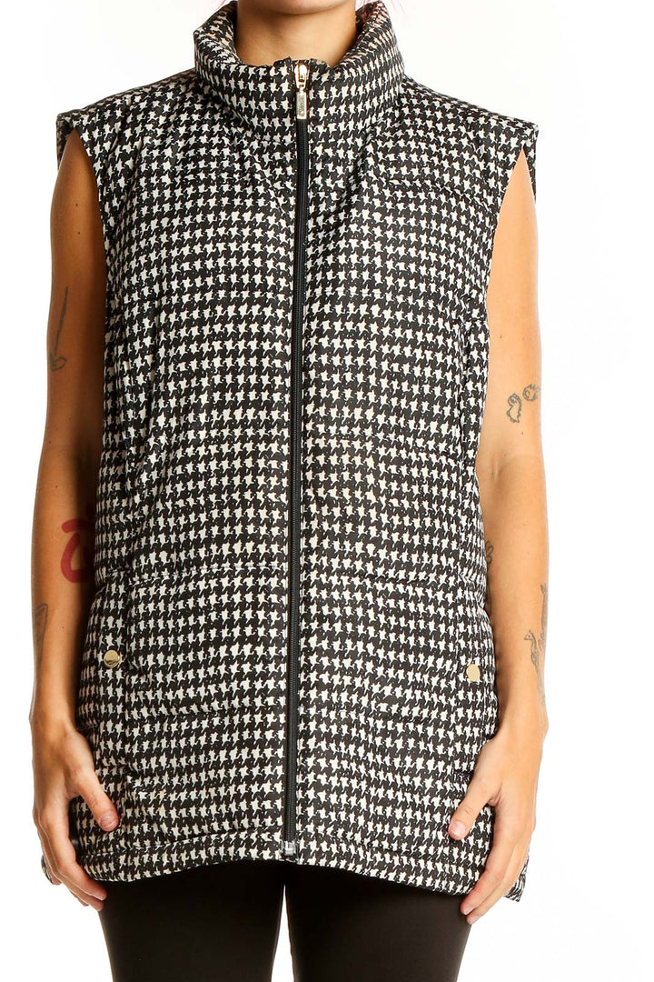 Front view of Charter Club black and white houndstooth puffer vest