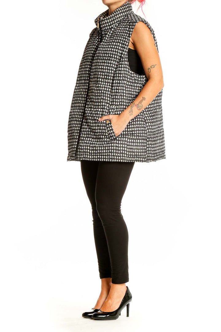 Front view of Charter Club black and white houndstooth puffer vest