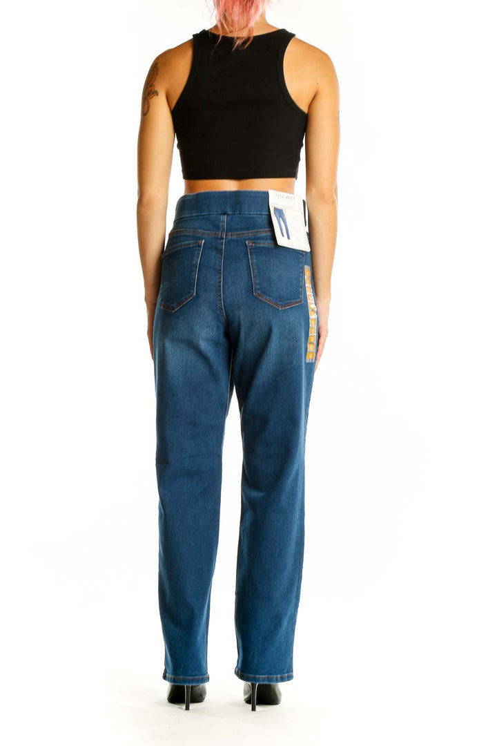 Back view of Nine West blue classic straight leg jeans on model