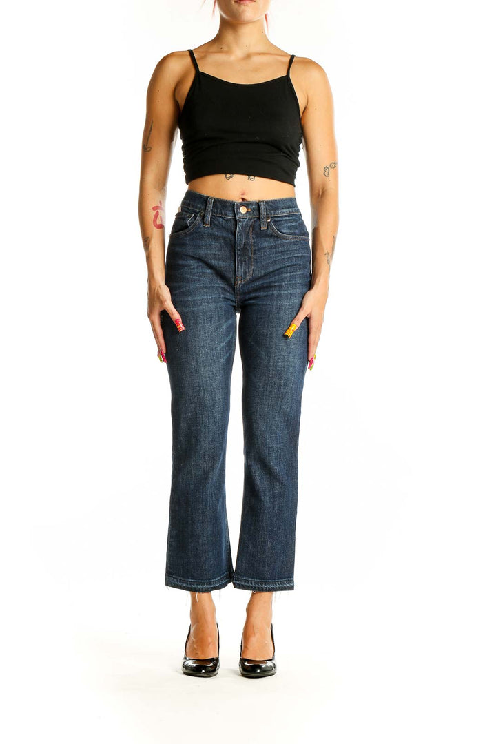 Front view of J.Crew dark blue cropped flare jeans on model