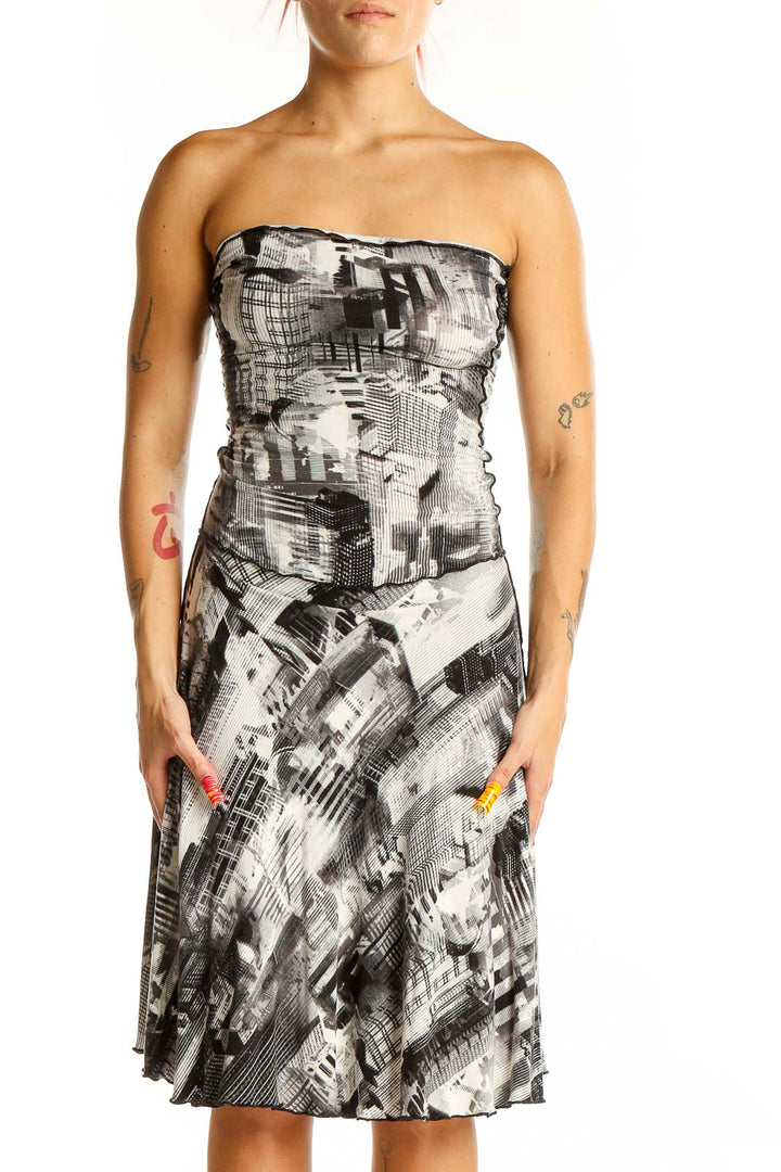 Front view of ANGELROX black and white abstract print strapless dress