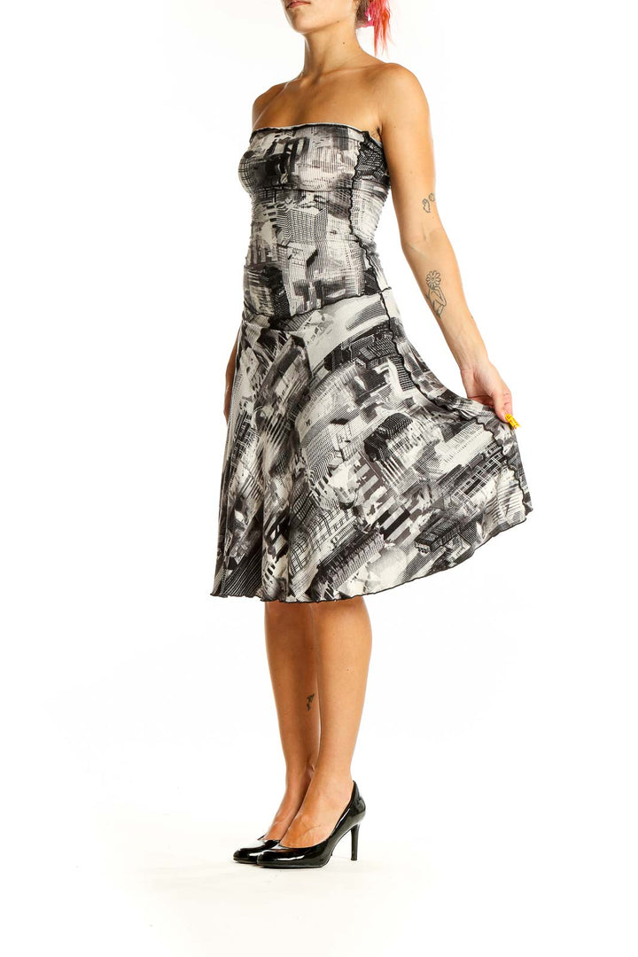 Front view of ANGELROX black and white abstract print strapless dress